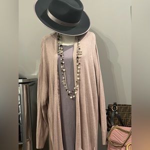 Mid length cardigan that will go with just about anything in your closet